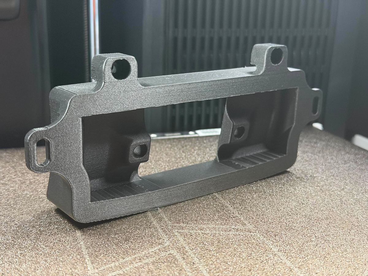 Rear of the keypad mount showing all four mounting tabs